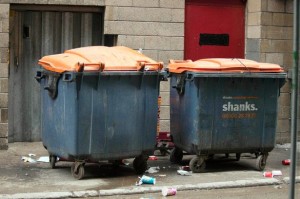 Garbage is crammed into containers
